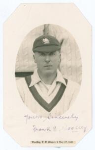 Frank Edward Woolley. Kent & England 1906-1938. Original mono real photograph postcard of Woolley depicted head and shoulders in cameo wearing cricket attire and England touring cap. Signed in ink below the image by Woolley. Thin paper strip attached to l