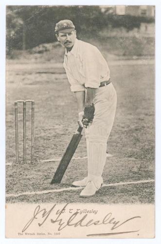 John Thomas Tyldesley. Lancashire & England 1895-1923. Early original mono postcard of Tyldesley standing full length in batting pose at the wicket, wearing Lancashire cap. Nicely signed in black ink to lower margin &lsquo;J.T. Tyldesley&rsquo;. Wrench Series no. 138