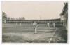 Leicestershire C.C.C. c.1920. Original mono real photograph postcard of members of the Leicestershire team practising on the outfield at Grace Road (?), with a sweeping grandstand in the background. Baxter&rsquo;s Photo Series, Hinckley. Minor creasing and wear