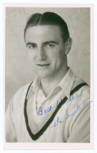 Gerald Arthur Smithson. Yorkshire, Leicestershire & England 1946-1956. Mono real photograph plain back postcard of Smithson, head and shoulders wearing cricket attire. Signed in blue biro to the photograph by Smithson. Official stamp for A. Wilkes & Son, 