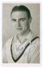 Gerald Arthur Smithson. Yorkshire, Leicestershire & England 1946-1956. Mono real photograph plain back postcard of Smithson, head and shoulders wearing cricket attire. Signed in blue biro to the photograph by Smithson. Official stamp for A. Wilkes & Son, 
