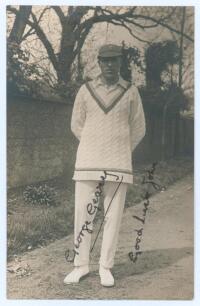 George Geary. Leicestershire & England 1912-1938. Excellent sepia real photograph postcard of Geary standing full length wearing cricket attire and cap. Signed in black ink to the photograph by Geary with handwritten dedication &lsquo;Good luck John&rsquo;. Nias of B