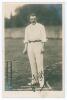 John Thomas Hearne. Middlesex & England 1888-1923. Excellent sepia real photograph postcard of Hearne, standing full length at the wicket in cricket attire, ball in hand. Very nicely signed in black ink &lsquo;J.T. Hearne&rsquo; to the image. Printed title &lsquo;J.T. Hear