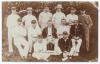 &lsquo;Nottingham XI&rsquo; c.1905. Early original sepia real photograph postcard of the Nottinghamshire team seated and standing in rows wearing cricket attire. Players featured include A.O. Jones (Captain), Oates, Iremonger, Hardstaff, Gunn etc. Foster of Brighton.