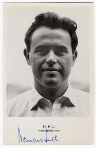 Norman Wilfred Hill. Nottinghamshire 1953-1968. Mono real photograph postcard of Hill, head and shoulders wearing cricket attire. Nicely signed in blue biro to lower margin &lsquo;Norman Hill&rsquo;. Sporting Handbooks Ltd., London. Postally unused. Very good conditi