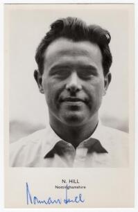 Norman Wilfred Hill. Nottinghamshire 1953-1968. Mono real photograph postcard of Hill, head and shoulders wearing cricket attire. Nicely signed in blue biro to lower margin &lsquo;Norman Hill&rsquo;. Sporting Handbooks Ltd., London. Postally unused. Very good conditi