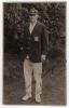 Willis Walker. Nottinghamshire 1913-1937. Original sepia real photograph postcard of Walker standing full length wearing Nottinghamshire blazer. Signed in black ink to the photograph &lsquo;Yours sincerely, W. Walker&rsquo;. Publisher unknown. The postcard has been p