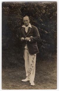 Arthur William Carr. Nottinghamshire & England 1910-1934. Original sepia real photograph postcard of Carr standing full length wearing M.C.C. touring blazer. Signed in black ink to the photograph &lsquo;A.W. Carr&rsquo;. Publisher unknown. Minor wear to corners, some