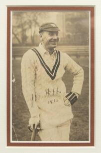John Berry &lsquo;Jack&rsquo; Hobbs, Surrey & England 1905-1934. Sepia real photograph postcard of Hobbs standing three quarter length wearing cricket attire and cap, leaning on his bat. Nicely signed by Hobbs in black ink to the photograph and dated &lsquo;1925&rsquo;. To the v