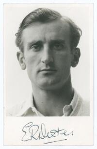 Edward Ralph &lsquo;Ted&rsquo; Dexter. Cambridge University, Sussex & England 1956-1968. Mono real photograph plain back postcard of Dexter, head and shoulders wearing cricket attire. Nicely signed in black ink to the lower margin, &lsquo;E.R. Dexter&rsquo;. Adhesive tape to ver