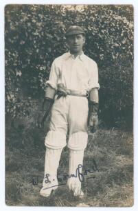 Walter Latter &lsquo;Tich&rsquo; Cornford. Sussex & England 1921-1947. Sepia real photograph postcard of Cornford standing full length wearing wicket-keeping attire and Sussex cap. Nicely signed in ink to the photograph &lsquo;W.L. Cornford&rsquo;. Official stamps to verso for N
