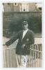 Wilfred Rhodes. Yorkshire & England 1898-1930. Mono real photograph postcard of Rhodes standing three quarter length wearing Yorkshire blazer and cap leaning on the railings, assumed to be at Scarborough. Nicely signed in ink to the photograph Walker&rsquo;s St