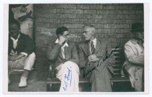 Yorkshire C.C.C. Bill Foord and Bill Bowes. Mono real photograph candid-style plain back postcard of Foord (Yorkshire 1947-1953) and Bowes (Yorkshire & England 1928-1947) seated together in conversation on a pavilion bench, c.1950. Signed in ink to the ph