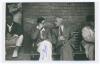 Yorkshire C.C.C. Bill Foord and Bill Bowes. Mono real photograph candid-style plain back postcard of Foord (Yorkshire 1947-1953) and Bowes (Yorkshire & England 1928-1947) seated together in conversation on a pavilion bench, c.1950. Signed in ink to the ph