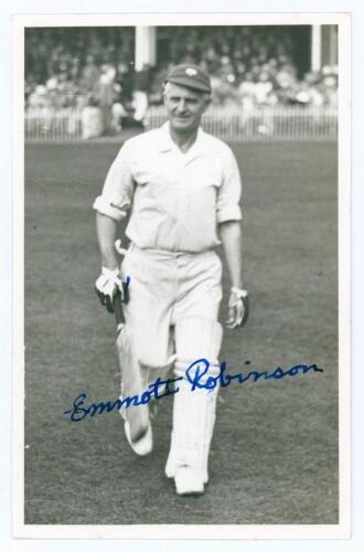 Emmott Robinson. Yorkshire 1919-1931. Original mono real photograph plain back postcard of Robinson walking off the field of play in batting attire, wearing Yorkshire cap. Nicely signed in blue ink to the photograph and to the verso by Robinson. Photograp
