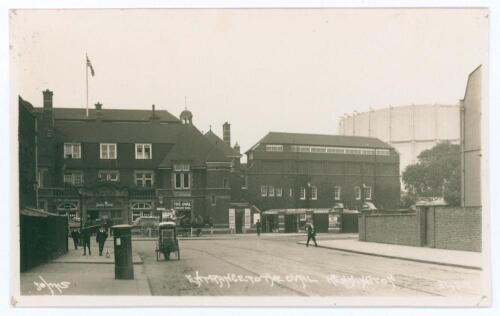 &lsquo;Entrance to The Oval, Kennington&rsquo; c.1910. Early original sepia real photograph postcard of the entrance to the Oval ground with the iconic gas holder in the background. Printed title to lower portion of the image. Published by Gale & Polden Ltd. Postally
