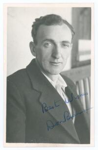 Donald Vincent &lsquo;Don&rsquo; Brennan. Yorkshire & England 1947-1955. Mono real photograph plain back postcard of Brennan, head and shoulders wearing cricket attire and blazer. Nicely signed in blue ink to the photograph by Brennan. Official stamp for A. Wilkes & 