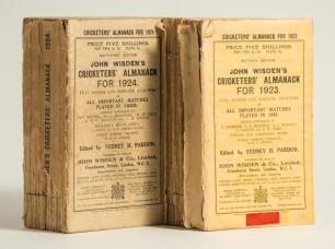 Wisden Cricketers&rsquo; Almanack 1923 and 1924. 60th & 61st editions. Original paper wrappers. The 1923 edition with heavy loss to the spine paper, breaking to the book block otherwise in good condition. the 1924 with faded and soiled wrappers, some loss to th