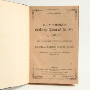 Wisden Cricketers&rsquo; Almanack 1873. 10th edition. Bound in dark green boards, with original paper wrappers, titles in gilt to front board and spine, red speckled page edges. Odd minor foxing spots otherwise in very good condition for its age and scarcity. P