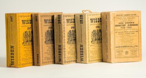 Wisden Cricketers&rsquo; Almanack 1933, 1939, 1940, 1946 and 1947. Original paper wrappers and cloth covered editions. The 1933 edition with some breaking to the book block, wear and small loss to spine paper, some wear and soiling to the wrappers, the 1939 ed