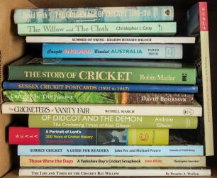 Large format cricket titles. Box comprising fourteen modern titles, the majority signed by the author with the odd limited edition. Signed hardbacks include &lsquo;The Golden Age of Cricket 1890-1914&rsquo;, David Frith 1978. &lsquo;The Story of Cricket&rsquo;, Robin Marlar 1979