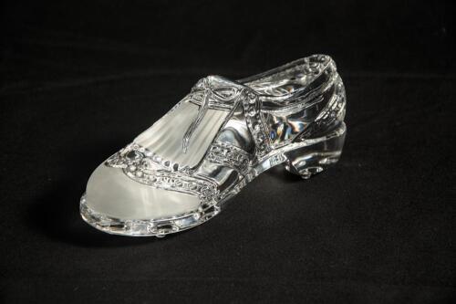 Golf shoe. A Nachtman of Germany lead crystal golf shoe paperweight with some frosted detail. 6&rdquo; long. Sold with a &lsquo;St Andrew&rsquo;s&rsquo; trinket box with moulded scenes of famous holes of the course by &lsquo;Design Craft. 4&rdquo; square. Both in good condition