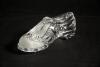 Golf shoe. A Nachtman of Germany lead crystal golf shoe paperweight with some frosted detail. 6&rdquo; long. Sold with a &lsquo;St Andrew&rsquo;s&rsquo; trinket box with moulded scenes of famous holes of the course by &lsquo;Design Craft. 4&rdquo; square. Both in good condition
