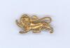 British Lions tour of South Africa 1938. A rare gilt metal pin badge in the form of a gilt lion, the reverse impressed &lsquo;B.R.F.T 1938&rsquo; (British Rugby Football Tour). Complete with original pin fittings and in very good condition. Sold with an official menu