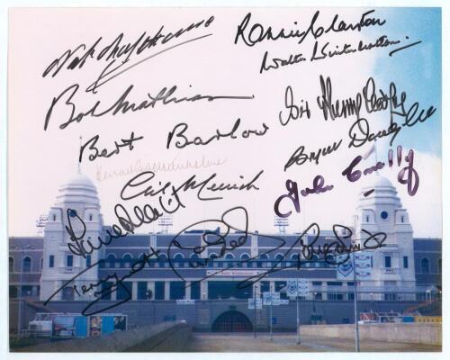 &lsquo;Wembley Greats&rsquo;. Modern colour photograph of the twin towers of the old Wembley stadium. Signed to the photograph in bold black ink by fourteen former footballers and others. Signatures are Nat Lofthouse, Bob Mathias, Bert Barlow, Kenneth Wolstenholme, G