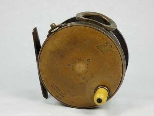 A Hardy Brass Faced 4" salmon fly reel, domed ivorine handle, brass foot, modified brass cage and pillars with fitted heavy brass line guide, strapped rim tension screw with Turk's head locking nut and 1906 calliper spring check mechanism, drum with four