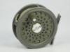 A Hardy JLH Ultralite #5 trout fly reel, grey anodised finish, composition handle, alloy foot, two screw spring latch and rear spindle mounted tension adjuster, little used condition, in modern Selvyt bag and a Hardy "Demon" 3 piece carbon trout fly rod, 