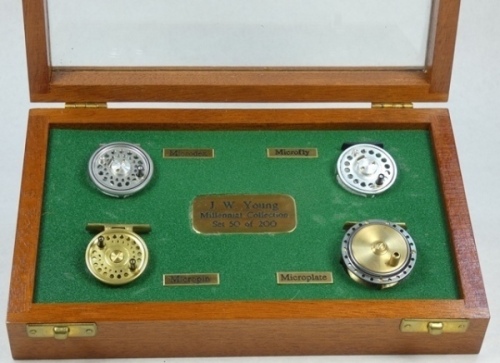 A J.W, Young Millennial Collection set of four miniature reels, ltd. ed. 50/200 and comprising four various models; Microdex, Microfly, Micropin and Microplate reels mounted in teak and glazed display case with brass name plates and an individual Young's 
