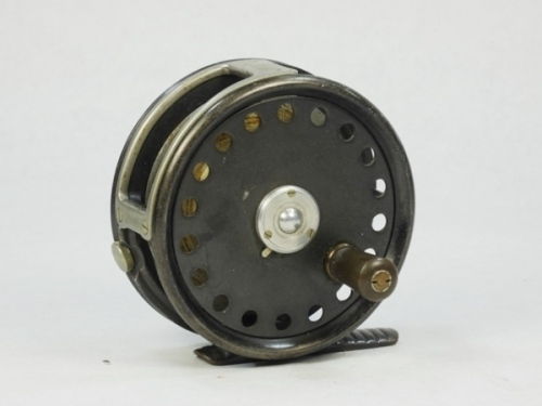 A fine and rare Hardy Barton 3 ¼" trout fly reel, reverse tapered ebonite handle, off-set ribbed brass foot, three screw spring drum latch, rectangular nickel silver line guide, milled rim tension screw and Mk.II check mechanism, interior stamped "J.S." 