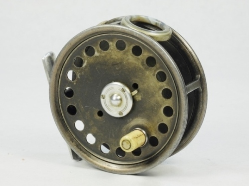 A scarce Hardy St George 3 3/8" trout fly reel, shallow cored drum with ivorine handle and three screw drum latch, unusual striated white agate line guide (two hairline cracks), alloy foot, milled rim tension screw and Mk.II check mechanism, light wear fr