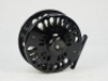 A good Abel Super 7/8N trout/salt-water fly reel, left hand wind model with black anodised finish, counter-balanced rosewood handle, multi-perforated shallow cored drum and backplate, rear spindle mounted tension adjuster, as new condition, in card box an - 2