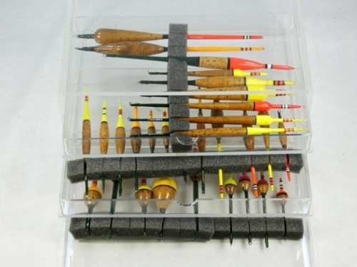 A collection of thirty Harcourt floats, various sizes and colours, ranging in size from 3" - 8", each with model name painted on stem, in perspex display case, 1950's