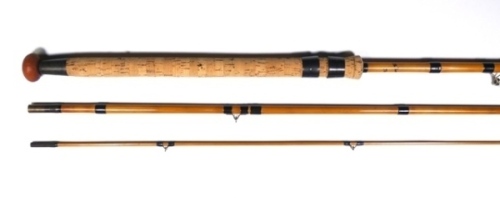 A Hardy "Surestrike" 3 piece whole and built cane coarse rod, 10'6", black silk whippings, sliding bronzed brass reel fittings, suction joints, agate lined butt and tip rings, very good condition, in later bag