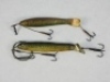 A Scarce Bazin 3 ½" gutta percha minnow bait, the fish shaped body with brown/gold painted decoration, incised scale pattern, amber/black spot glass eyes, twin gimp mounted flying treble hooks, metal tail stamped makers details, and a Peel, Redditch 4" Pe