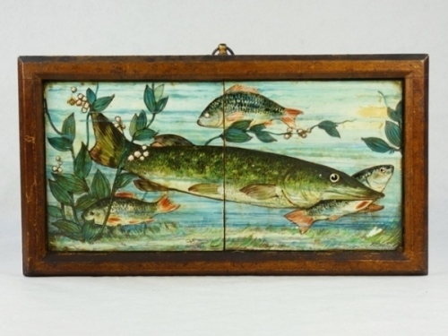 A pair of C19th Century polychrome diptych painted tiles depicting a pike attacking roach within an aquatic setting, indistinctly signed, set in gilt painted frame, 7 ¼" x 13" overall
