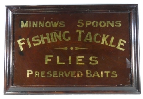 A fine and rare Edwardian framed glass advertising plaque, gilt lettered "Fishing Tackle, Minnows, Spoons, Flies and Preserved Baits, dark mahogany backboard and mounted within a heavy mahogany frame, 19 ½" x 29" overall (see illustration)