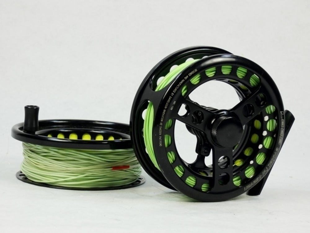 A Danielsson Loop Evotec FW 4Seven trout fly reel and spare spool