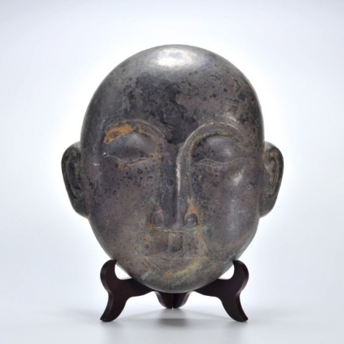 A Silver Figural Mask