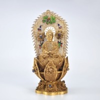 An Enameled Silver Gilt Seated Buddha