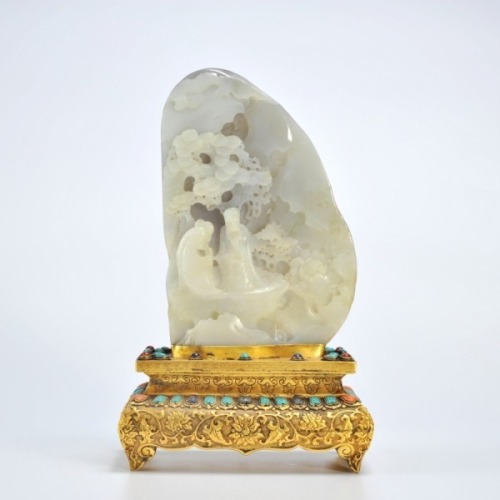 A Carved Jade Boulder Buddha