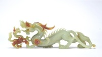 A Carved Celadon Jade Dragon