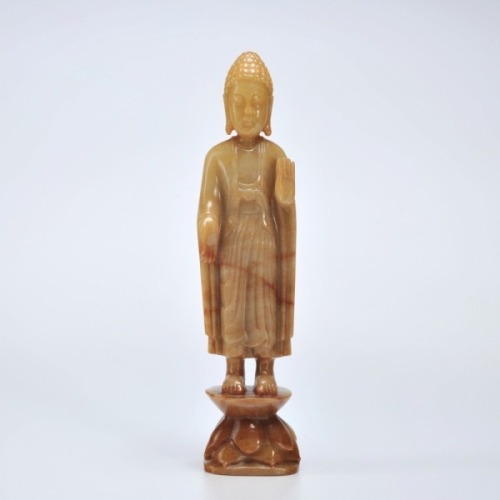 A Carved Jade Standing Shakyamuni