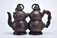 A Yixing Glazed Teapot