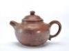 A Yixing Glazed Teapot