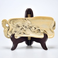 A Carved Organic Material Ink Slide Stand