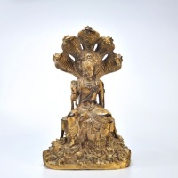 A Gilt Bronze Seated Figure